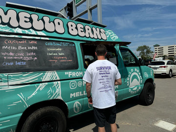 Mello Beans coffee van with a person standing next to it on a street. Virginia Beach; Coffee; Mobile coffee; Coffee near me; local coffee